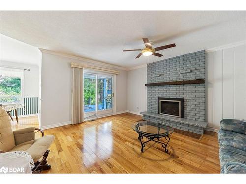 51 Idlewood Drive, Midhurst, ON - Indoor Photo Showing Living Room With Fireplace