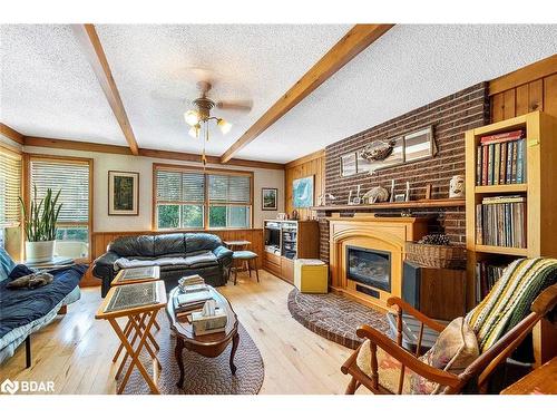 1475 6Th Line, Innisfil, ON - Indoor Photo Showing Living Room With Fireplace