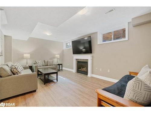 28 Gwendolyn Street, Barrie, ON - Indoor Photo Showing Living Room With Fireplace