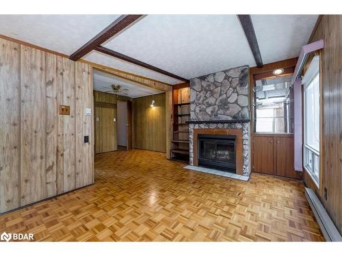 50 Hawthorne Drive, Innisfil, ON - Indoor Photo Showing Living Room With Fireplace