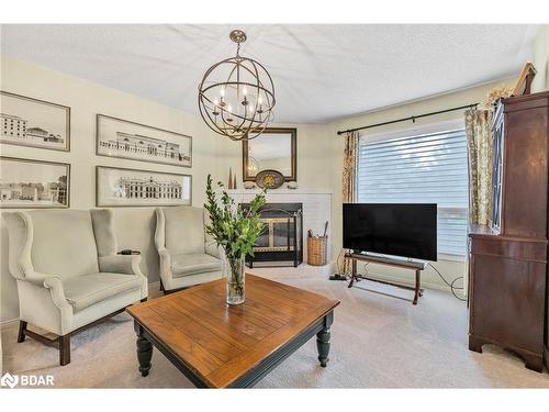 38 Irwin Drive, Barrie, ON - Indoor Photo Showing Living Room With Fireplace