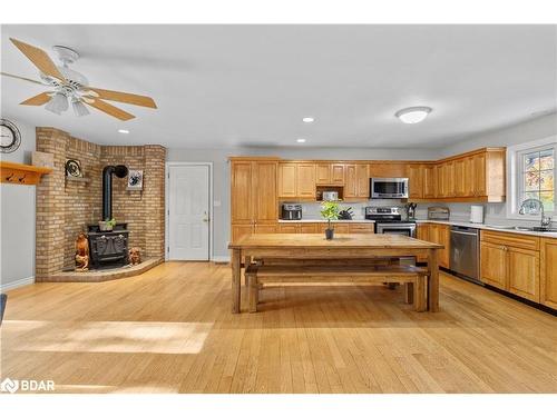 6072 5Th Side Road, Innisfil, ON - Indoor Photo Showing Kitchen With Fireplace