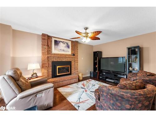 28 Thackeray Crescent, Barrie, ON - Indoor Photo Showing Living Room With Fireplace