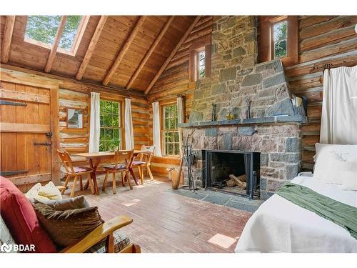 1569 Dyer Memorial Rd Road, Huntsville, ON - Indoor Photo Showing Living Room With Fireplace