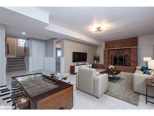 18 Nugent Court, Barrie, ON - Indoor Photo Showing Living Room With Fireplace