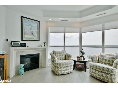 1503-6 Toronto Street, Barrie, ON - Indoor Photo Showing Living Room With Fireplace