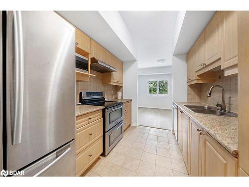 102-45 Ferndale Drive S, Barrie, ON - Indoor Photo Showing Kitchen With Double Sink