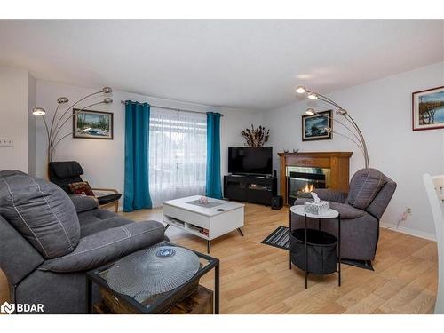 22 Primrose Lane, Innisfil, ON - Indoor Photo Showing Living Room With Fireplace