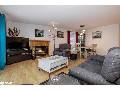 22 Primrose Lane, Innisfil, ON - Indoor Photo Showing Living Room With Fireplace