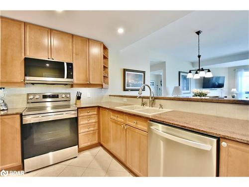 709-6 Toronto Street, Barrie, ON - Indoor Photo Showing Kitchen With Double Sink