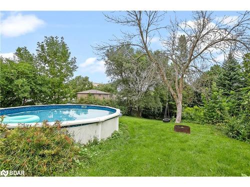 180 Angeline Street N, Lindsay, ON - Outdoor With Above Ground Pool With Backyard