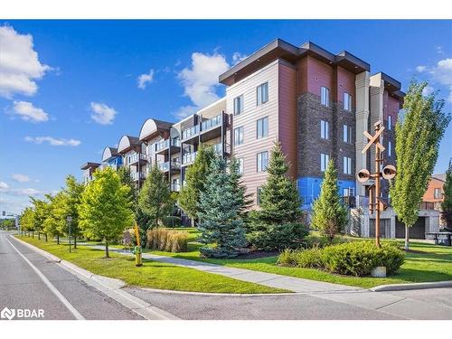 102-100 Dean Avenue, Barrie, ON - Outdoor With Balcony With Facade