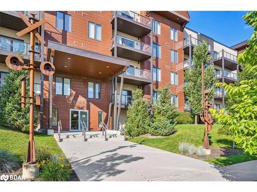 102-100 Dean Avenue, Barrie, ON - Outdoor With Balcony With Facade