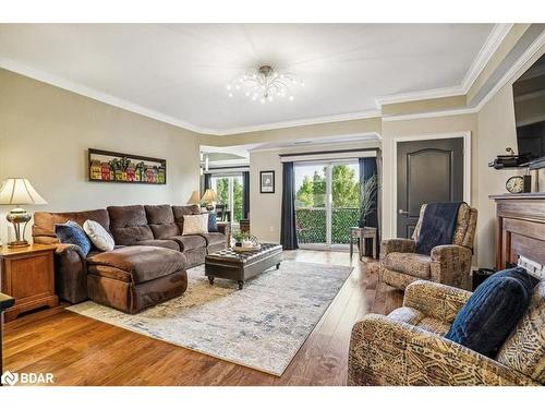 102-100 Dean Avenue, Barrie, ON - Indoor Photo Showing Living Room