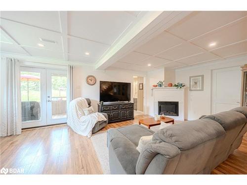 143 South Waseosa Lake Road, Huntsville, ON - Indoor Photo Showing Living Room With Fireplace