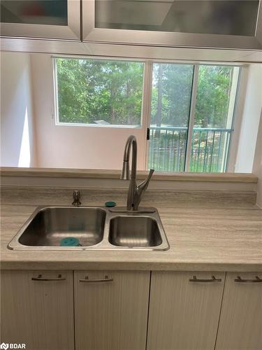 102-75 Ellen Street, Barrie, ON - Indoor Photo Showing Kitchen With Double Sink