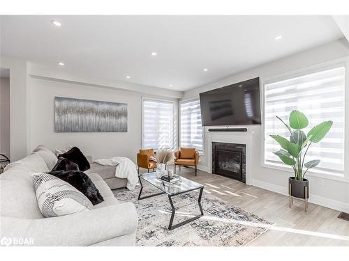 45 Wood Crescent, Angus, ON - Indoor Photo Showing Living Room With Fireplace