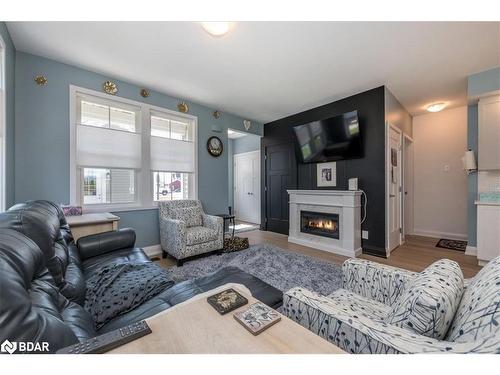 2 Danielle Crescent, Midland, ON - Indoor Photo Showing Living Room With Fireplace