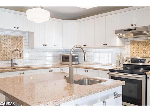 64 Mcdermitt Trail, Victoria Harbour, ON - Indoor Photo Showing Kitchen With Double Sink With Upgraded Kitchen