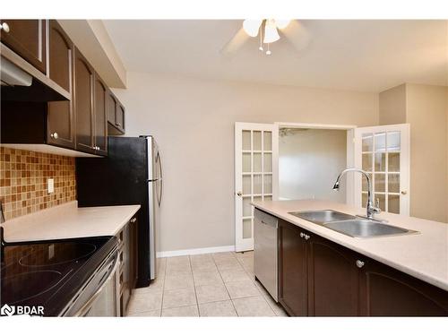 9-175 Stanley Street, Barrie, ON - Indoor Photo Showing Kitchen With Double Sink