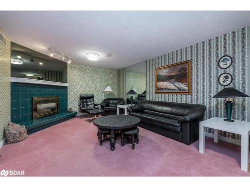 16 Tower Crescent, Barrie, ON - Indoor Photo Showing Living Room With Fireplace