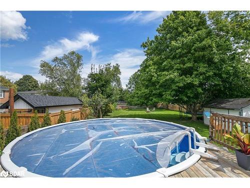 126 Adelaide Street N, Lindsay, ON - Outdoor With Above Ground Pool With Backyard