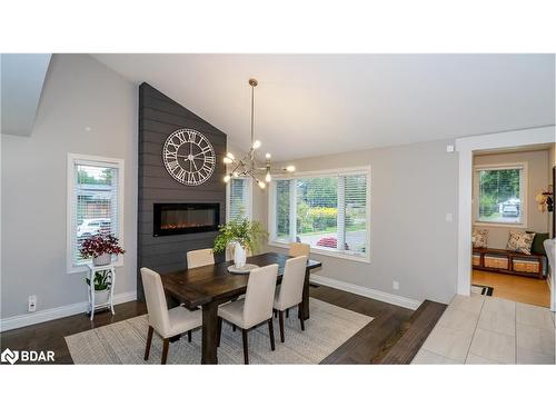 2169 Willard Avenue, Innisfil, ON - Indoor Photo Showing Dining Room With Fireplace