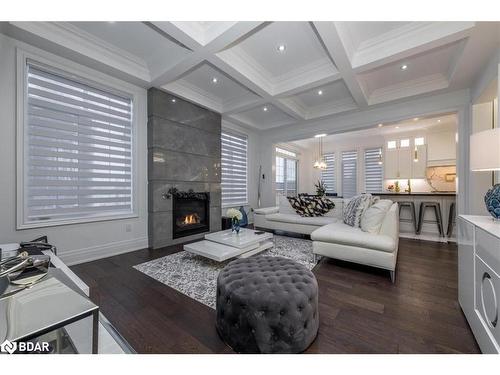 1 Curtis Way, Springwater, ON - Indoor Photo Showing Living Room With Fireplace