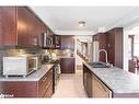 142 Livingstone Street W, Barrie, ON  - Indoor Photo Showing Kitchen With Double Sink With Upgraded Kitchen 