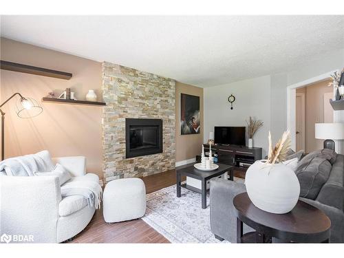 142 Livingstone Street W, Barrie, ON - Indoor Photo Showing Living Room With Fireplace