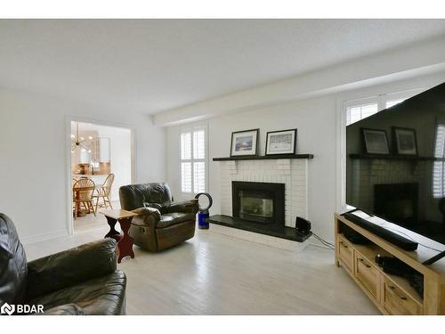 58 Brushwood Crescent, Barrie, ON - Indoor Photo Showing Living Room With Fireplace