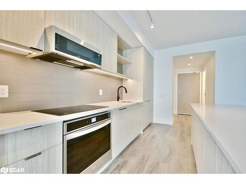 702-185 Dunlop Street East, Barrie, ON - Indoor Photo Showing Kitchen With Upgraded Kitchen