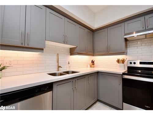 404-20 Koda Street, Barrie, ON - Indoor Photo Showing Kitchen With Double Sink