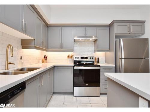 404-20 Koda Street, Barrie, ON - Indoor Photo Showing Kitchen With Double Sink With Upgraded Kitchen