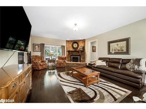 2038 Snow Valley Road, Springwater, ON - Indoor Photo Showing Living Room With Fireplace