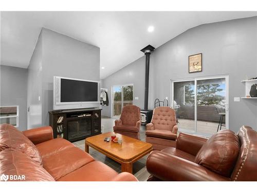 11 Nickles Cove Road, Whitestone, ON - Indoor Photo Showing Living Room With Fireplace