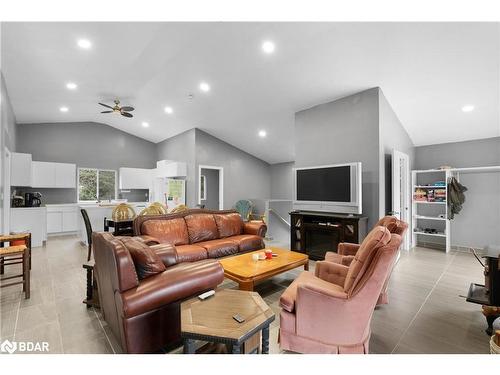 11 Nickles Cove Road, Whitestone, ON - Indoor Photo Showing Living Room With Fireplace