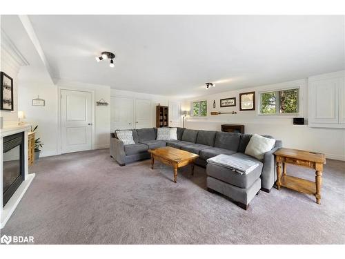 3 Earldom Boulevard, Port Mcnicoll, ON - Indoor Photo Showing Living Room With Fireplace