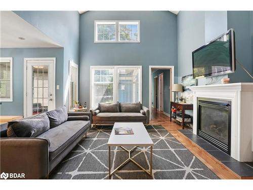 11 Rosemary Road, Tiny Twp, ON - Indoor Photo Showing Living Room With Fireplace