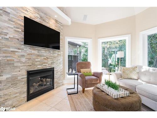 14 Lloyd Cook Drive W, Springwater, ON - Indoor Photo Showing Living Room With Fireplace