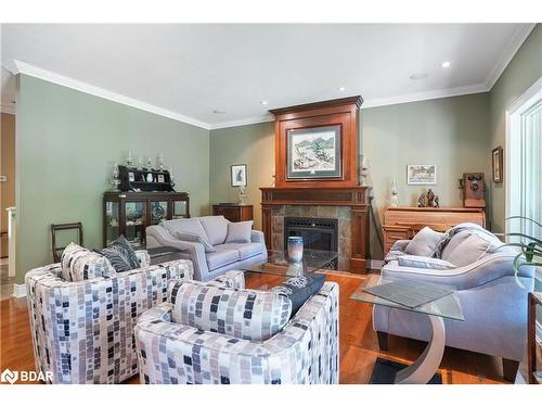 1643 The Angela Schmidt Foster Road, Tiny, ON - Indoor Photo Showing Living Room With Fireplace