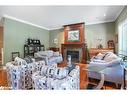 1643 The Angela Schmidt Foster Road, Tiny, ON  - Indoor Photo Showing Living Room With Fireplace 