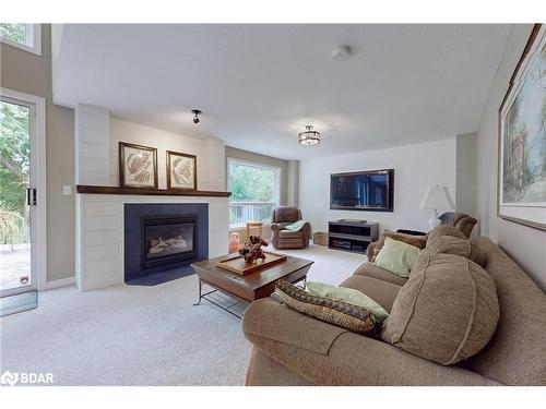 86 Osprey Ridge Road, Barrie, ON - Indoor Photo Showing Living Room With Fireplace