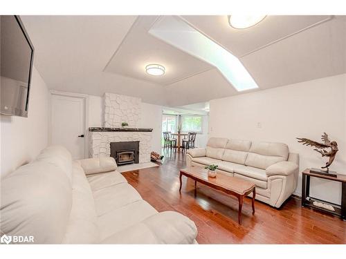 3923 Algonquin Avenue, Innisfil, ON - Indoor Photo Showing Living Room With Fireplace