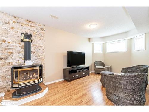 109 Dyer Drive, Wasaga Beach, ON - Indoor Photo Showing Living Room With Fireplace