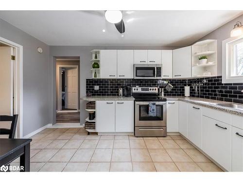 23 Leisure Court, Coldwater, ON - Indoor Photo Showing Kitchen With Double Sink