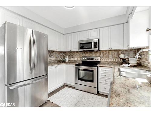 35 Reid Crescent, Collingwood, ON - Indoor Photo Showing Kitchen With Double Sink