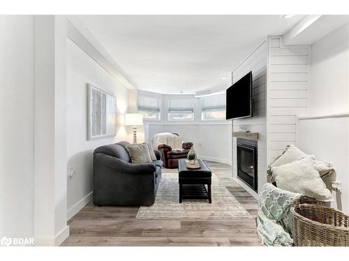 35 Reid Crescent, Collingwood, ON - Indoor Photo Showing Living Room With Fireplace