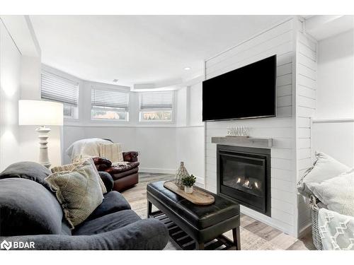 35 Reid Crescent, Collingwood, ON - Indoor Photo Showing Living Room With Fireplace