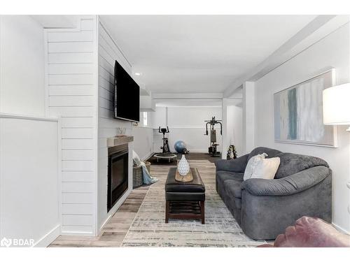 35 Reid Crescent, Collingwood, ON - Indoor Photo Showing Living Room With Fireplace